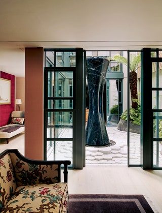 Image may contain French Door Door Furniture and Chair