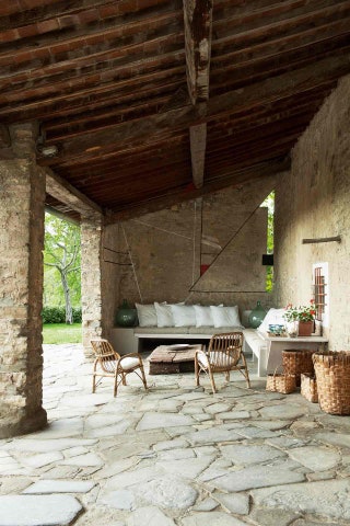 Image may contain Patio Flagstone Porch Pergola Interior Design Indoors and Furniture