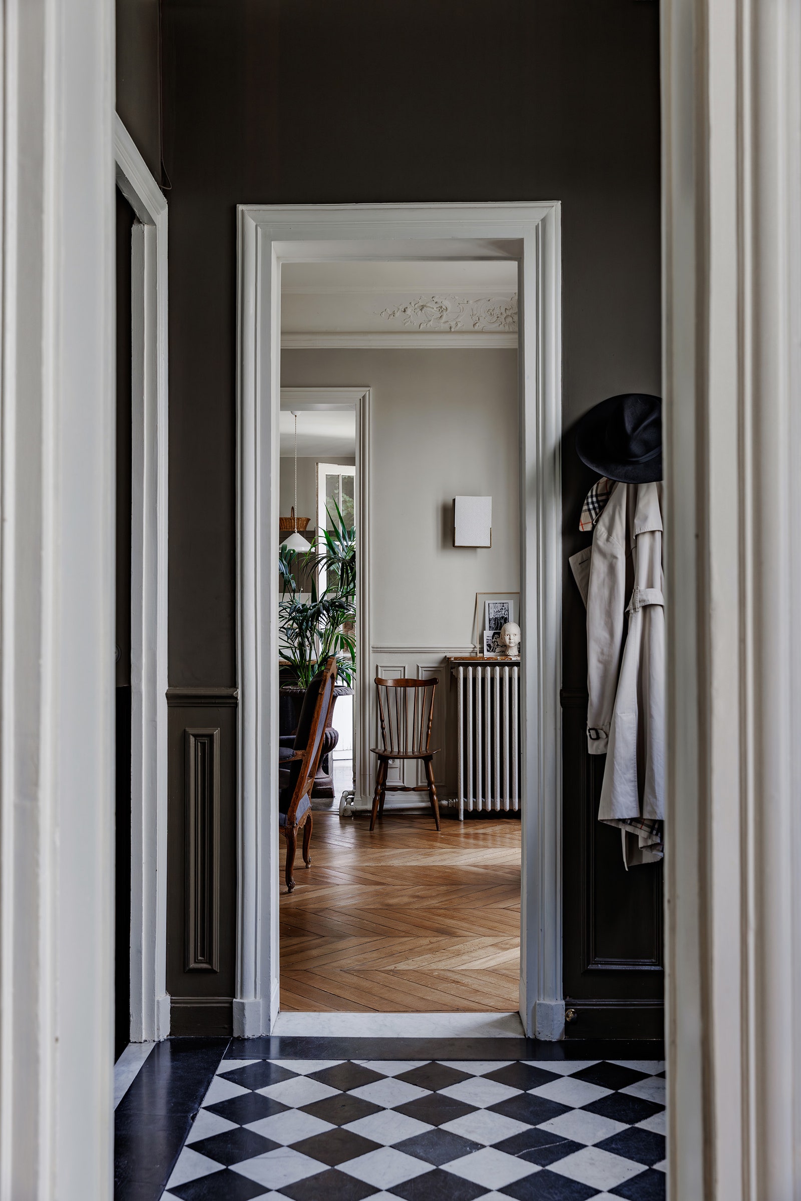 The original 19thcentury chequerboard floor is still intact in the hallway. It leads on one side to the dining and...