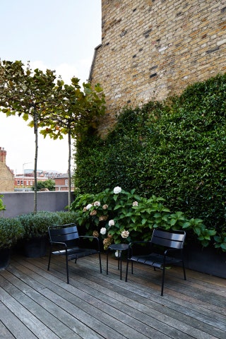 Image may contain Furniture Chair Terrace Outdoors and Garden