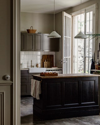 The french doors lead down to the garden at the front of the house.